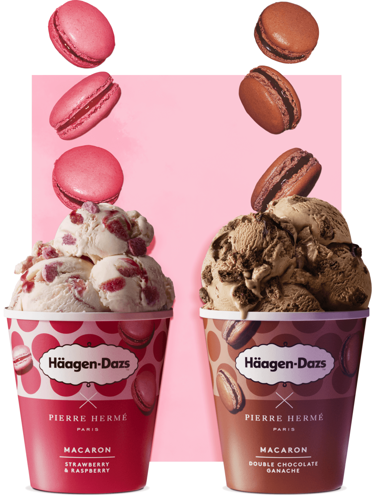 Two cups of Häagen-Dazs ice cream with macrons falling on them